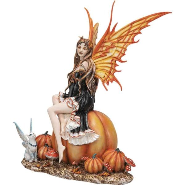 Fairy Sitting on a Pumpkin Statue